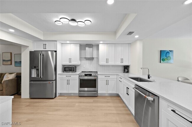 Foto del edificio - 6360 Pelican Bay Blvd