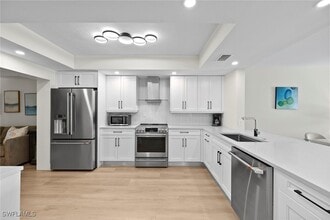 Building Photo - 6360 Pelican Bay Blvd