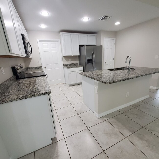 Building Photo - Coming Soon! 4 Bedroom 2 Bath Annual Rental in NW Cape!