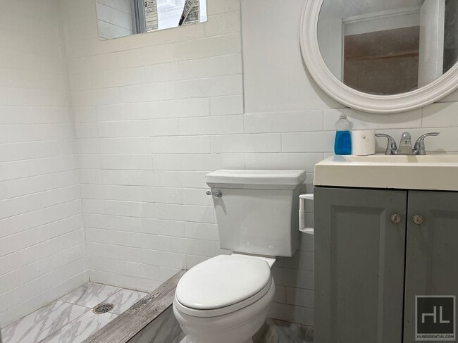 Building Photo - 2BR 1BA Lower Level All Utilities Included w/ Laundry Beside Highland Park