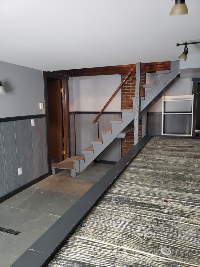 Basement stairs from behind the bar - 107 N Monroe St