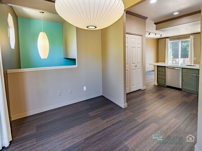 Building Photo - Discover your new home in the sought-after...
