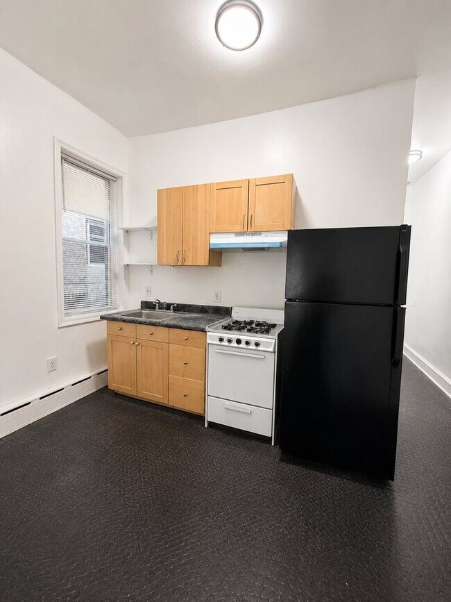 Foto del edificio - 7020 Woodland Ave