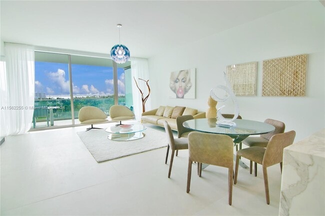 Building Photo - 10201 Collins Ave