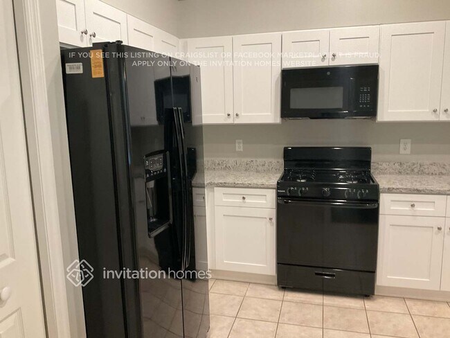 Foto del edificio - 9315 Poplar Creek Ct