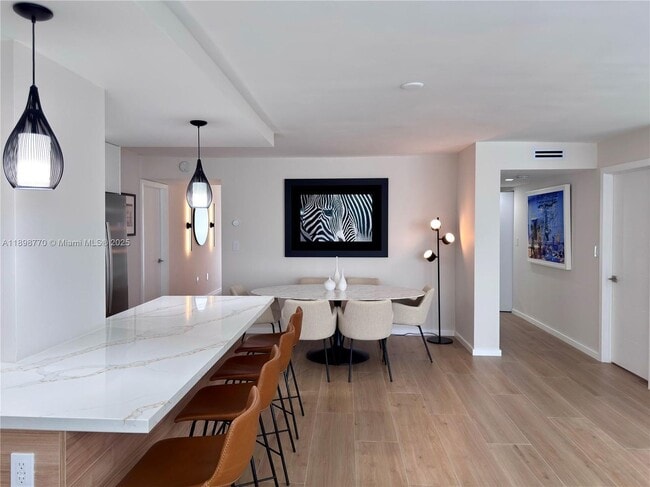 Building Photo - 10230 Collins Ave