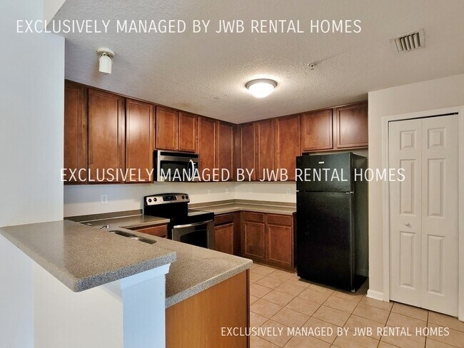 Foto del edificio - 7035 Deer Lodge Cir