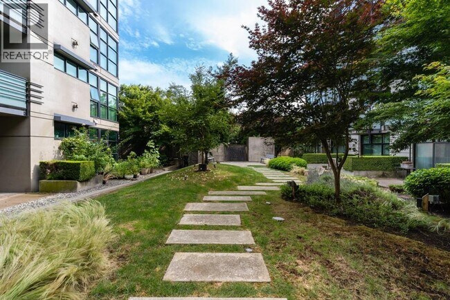 Photo du bâtiment - 8988-8988 Hudson St