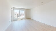 Located at 510 South Oxford Avenue in Los Angeles, this modern 2-bedroom, 2-bathroom residence offers a thoughtfully designed single-floor layout with a clean, contemporary aesthetic throughout. Light-toned hardwood flooring flows consistently across the living spaces, complementing the bright white walls and recessed lighting that give the home an airy, open feel.

The kitchen is well-appointed with grey cabinetry featuring gold hardware, a marble-look quartz countertop with a subway tile backsplash, and stainless steel appliances including a large French door refrigerator and a gas range. The adjacent living area receives abundant natural light through a large picture window offering views of the surrounding Los Angeles neighborhood.

The generously sized primary bedroom provides ample space and connects to a dedicated walk-in closet with wrap-around shelving and hanging rods. The primary bathroom features a wide grey vanity with quartz countertop, a large mirror with overhead lighting, and a glass-enclosed walk-in shower. The second bedroom is bright and well-proportioned, with a sliding door closet and recessed lighting. The second bathroom includes a glass-enclosed shower with tile surround and light wood flooring. A dedicated laundry area houses a modern stacked washer and dryer unit for added convenience.