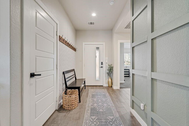 Building Photo - "Energy-Efficient 4-2 Home with Designer Finishes and a Spacious Backyard Retreat!"