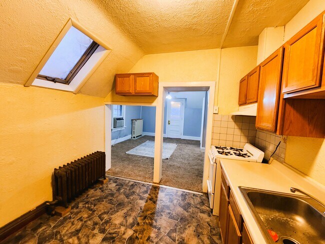 Cocina a sala de estar - 53 W 9th St