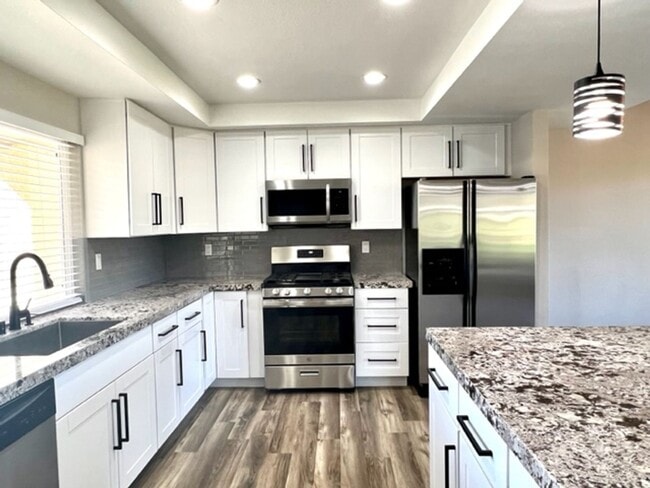 Building Photo - Beautifully Remodeled 3 Bedroom Pool Home ...