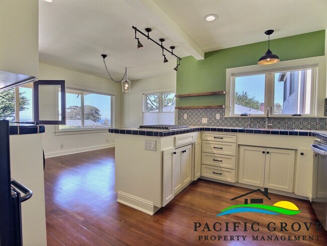 Building Photo - Classic Pacific Grove Charm with Bay Glimpses & Light-Filled Living