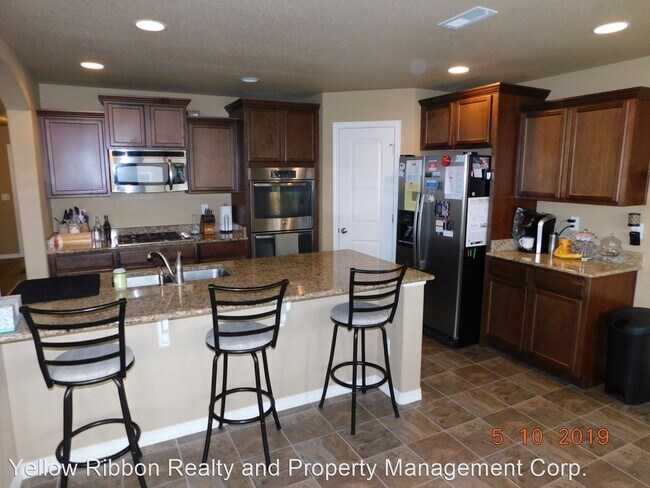 Building Photo - 4 br, 3 bath House - 9511 Desert Lily Circle