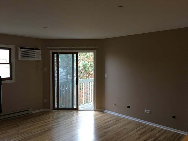 Living room with slider to balcony - 1354 Cunat Court