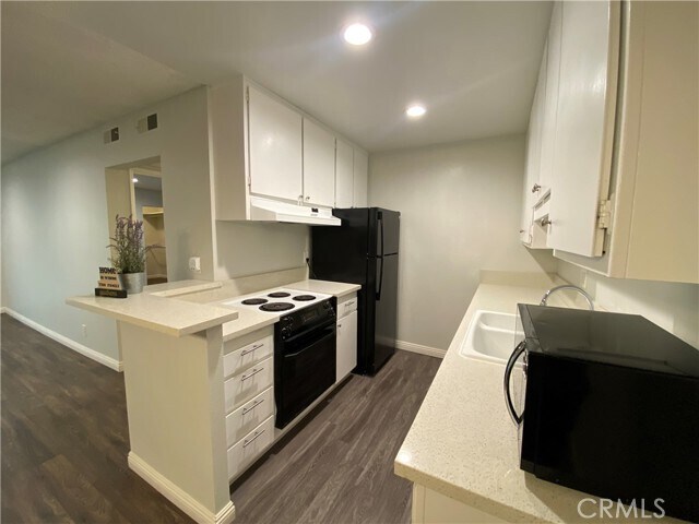 Foto del edificio - 424 N Bellflower Blvd