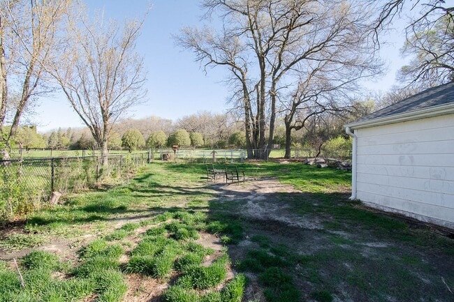 Building Photo - Fenced Yard, 2-Car Garage + Internet Included