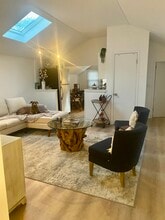 LR w/ vaulted ceiling and skylight - 115 10th Ave