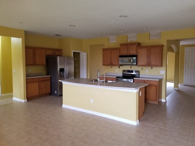 Building Photo - Beautiful 4 bed 2 bath home in Villa Sol C...