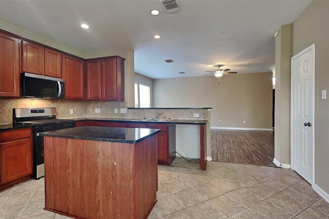 Foto del edificio - 7418 Jacobs Well Dr