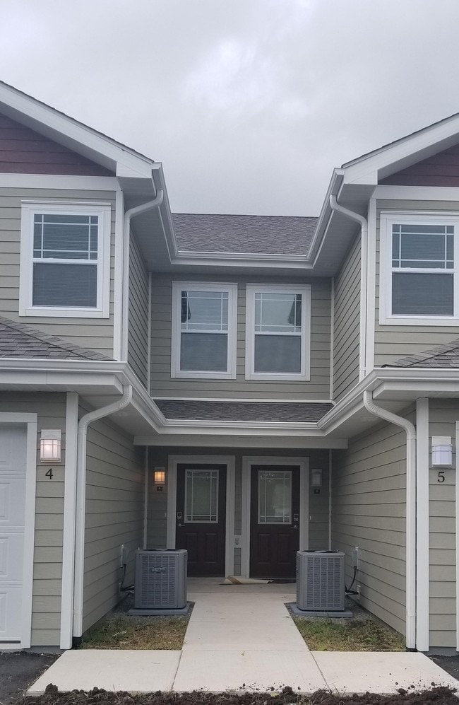 Building Photo - Whispering Echoes Townhomes