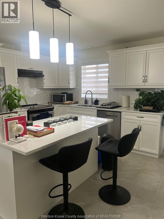 Photo du bâtiment - 1185 Aspen Ridge Cres