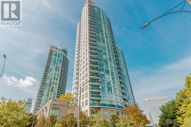 Photo du bâtiment - 90 Absolute Ave