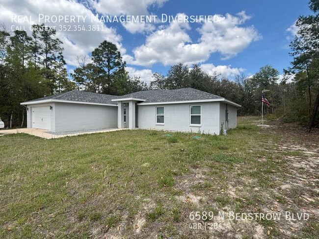 Building Photo - 6589 N Bedstrow Blvd
