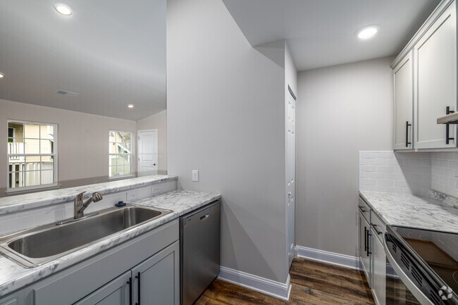 E2 2BR, 2BA - 1,120 SF - Kitchen - Spring Meadow Apartments