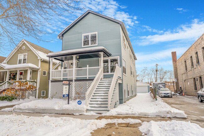 Building Photo - 4019 N Tripp Ave