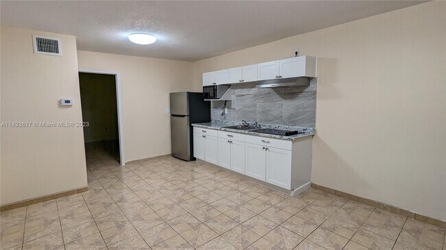 Building Photo - 6915 SW 136th Ct
