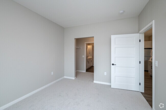 2BR, 2BA - 1,015SF - Primary Bedroom - Compass