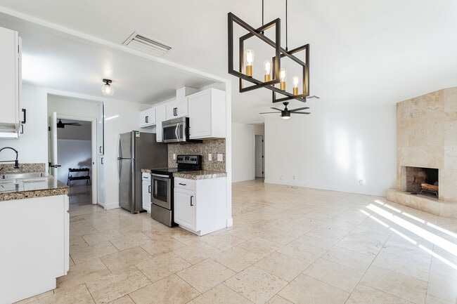 View from dining to kitchen, living unfurnished - 3112 La Mesa Dr