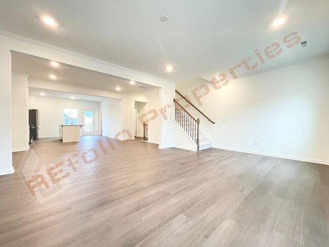 Foto del edificio - Brand New 3 Story, 4 bedroom, 3.5 bathroom Townhome Featuring a 1st floor Guest Suite, 2 Car Gara...