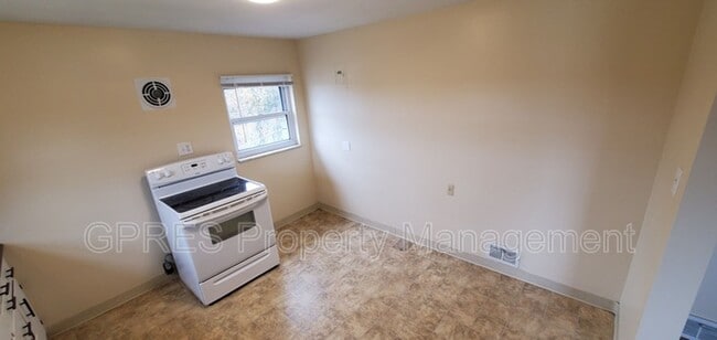 Building Photo - 5706-5708 Poketa Rd.