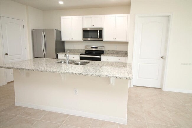 Foto del edificio - 9488 Black Walnut Dr