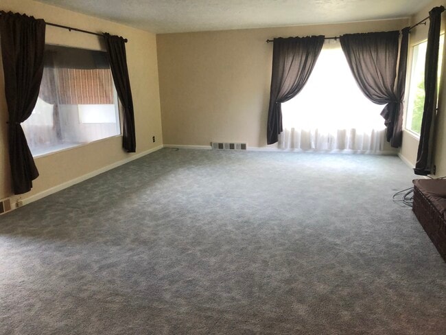 Living Room, sun room to left - 1000 Cherry St