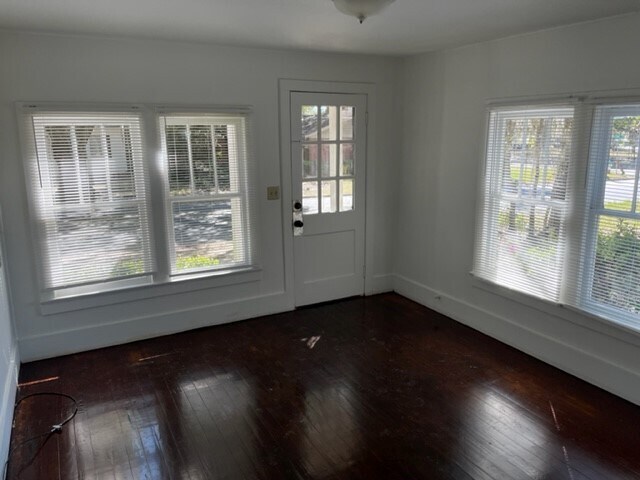 Front-living room. Note refinished floors! - 208 W Ann St
