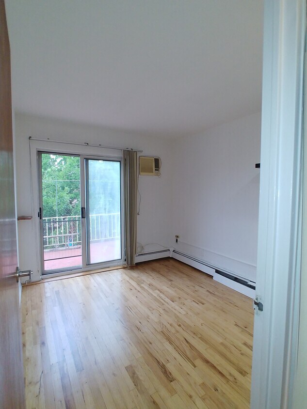 Bedroom w Balcony Access - 3248 69th St