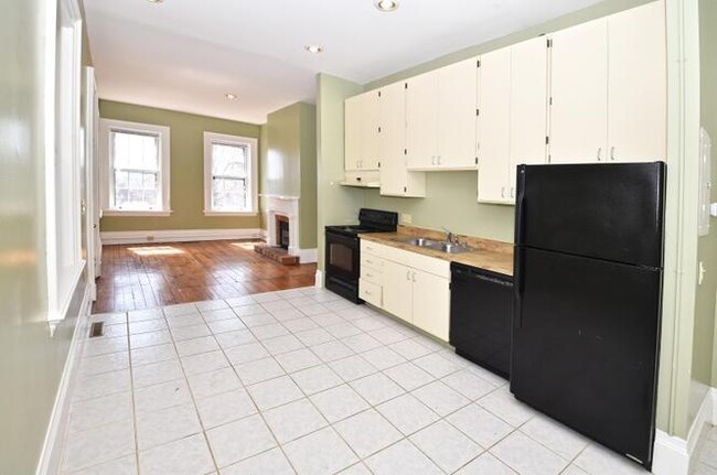 Spacious open plan kitchen. Tons of space for an island or table. - 505 Milton St