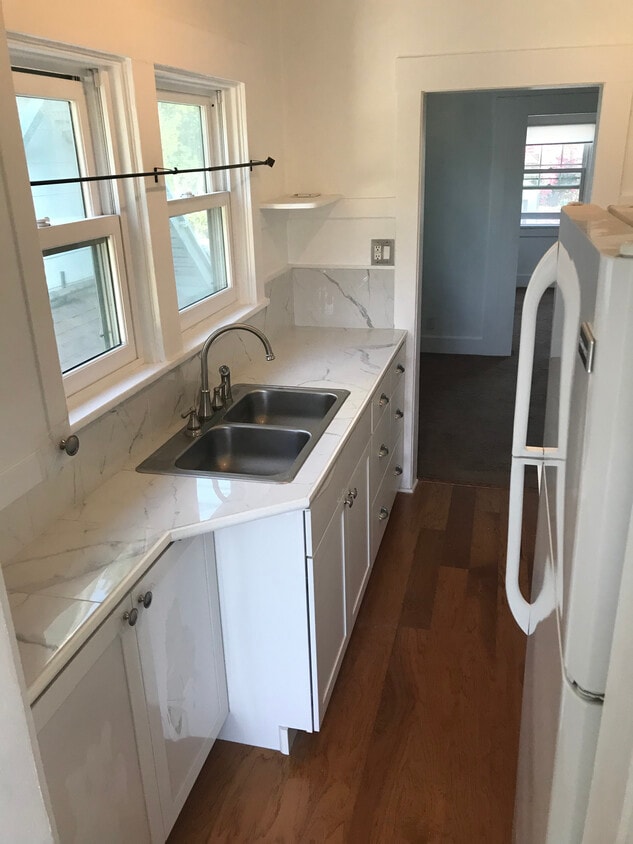 Kitchen w/ new cabinets and stove - 1011 1/2 N Coronado St