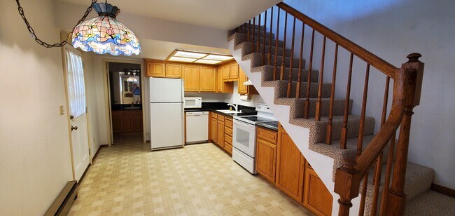 Downstairs has kitchen, dining area, and bathroom. - 17276 James Lex Ln