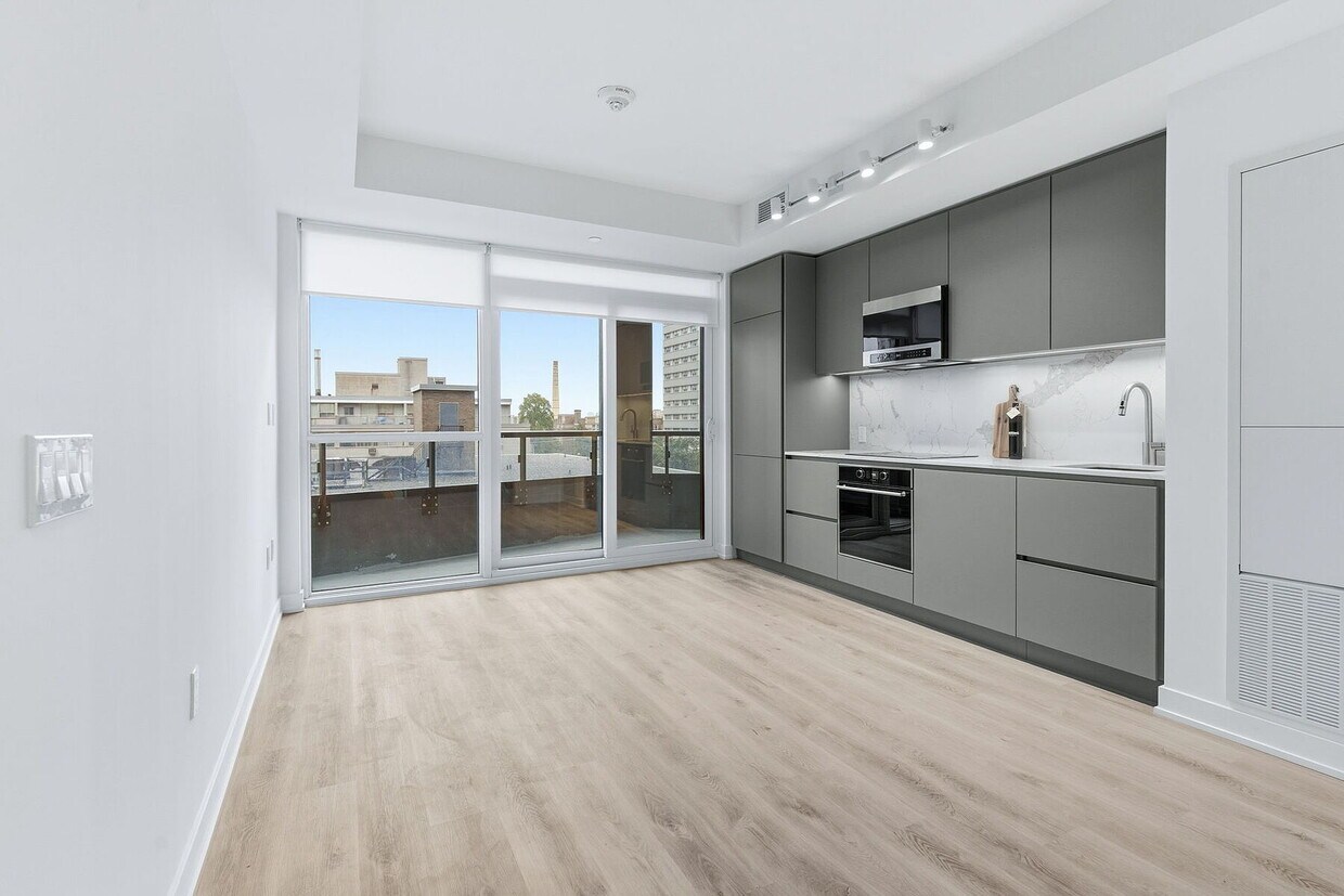 Photo principale - 110-4110 Broadway Ave