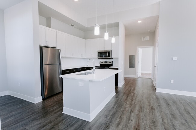Experience the allure of modern design in this sleek and stylish kitchen. - The Landon at New Albany Park