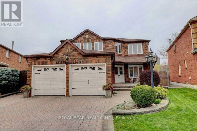 Photo du bâtiment - 5223 Tagish Ct