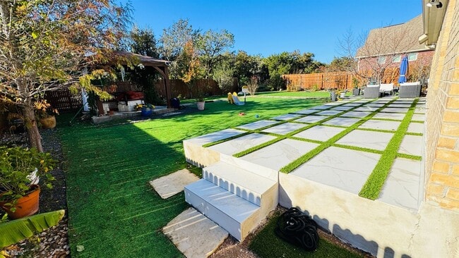 Foto del edificio - 4 br, 3.5 bath House - 8701 Whispering Trail