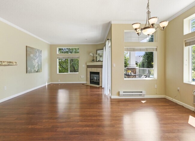 living & dining rooms with gas fireplace and 9' ceilings - 14695 SW Beard Rd