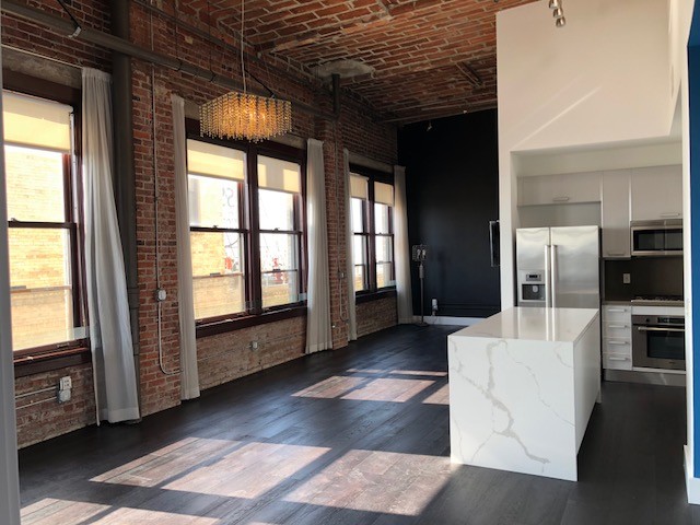 main living space and kitchen - 460 S Spring St