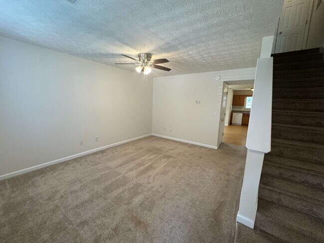 Building Photo - Built in 2004, this two-story townhouse in the Wellington Walk community offers 1,205 square feet...