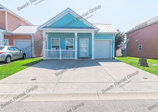 Building Photo - 605 Surfsong Way